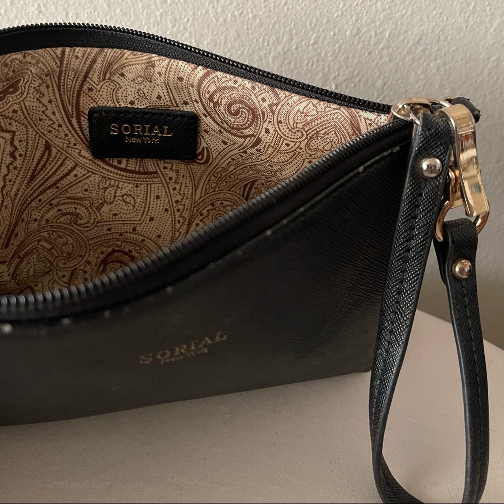 Sorial New York black leather wristlet with paisley interior